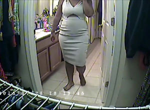 Round black mother caught on spy web cam