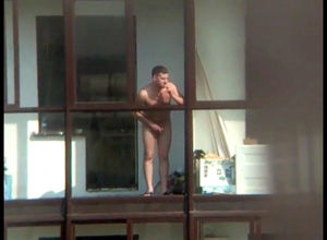 Bare boy on the balcony in spy spycam..
